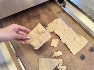 Why does tofu skin bubble during microwave drying